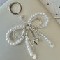 white and silver bow charm keychain